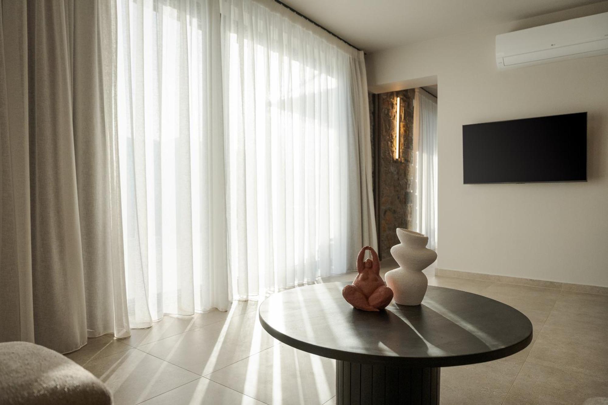Neromai Cave Luxury Villas Koxaré Habitación foto